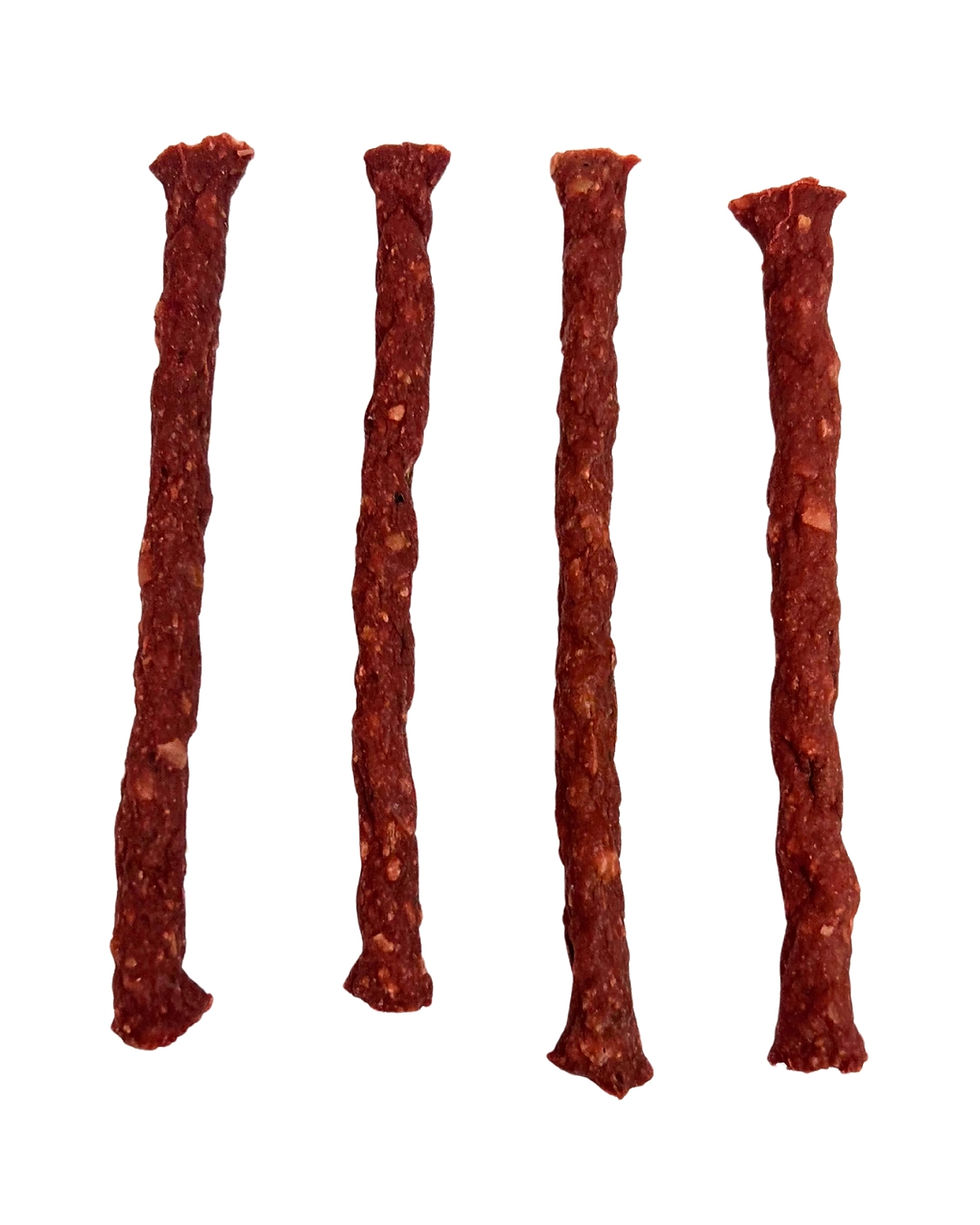 Four muscle meat sticks arranged vertically