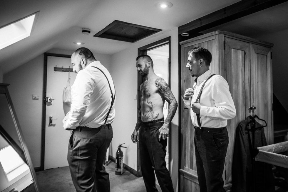 Groomsmen preparing for wedding at Hook Norton Brewery