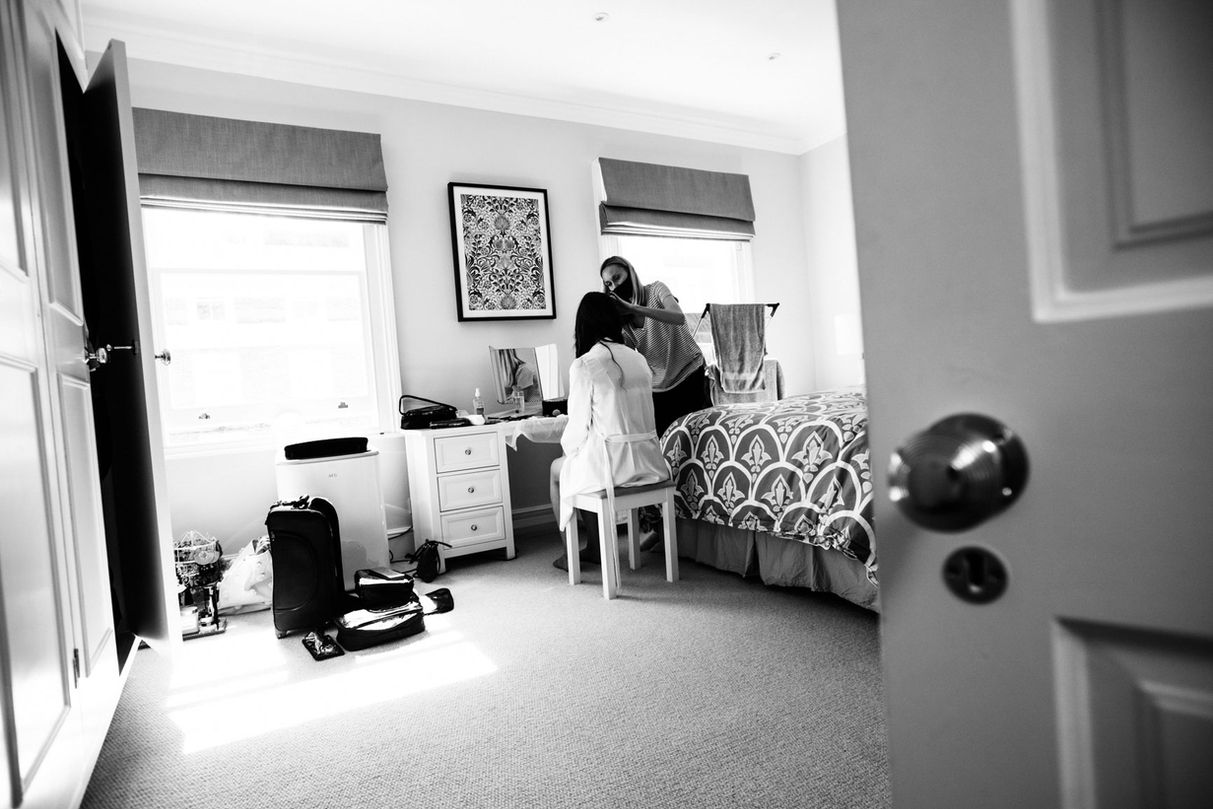 Bride's hair styled in hotel room