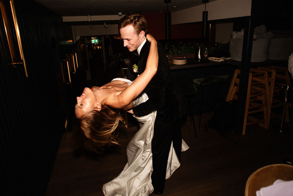 Happy couple's first dance, wedding reception