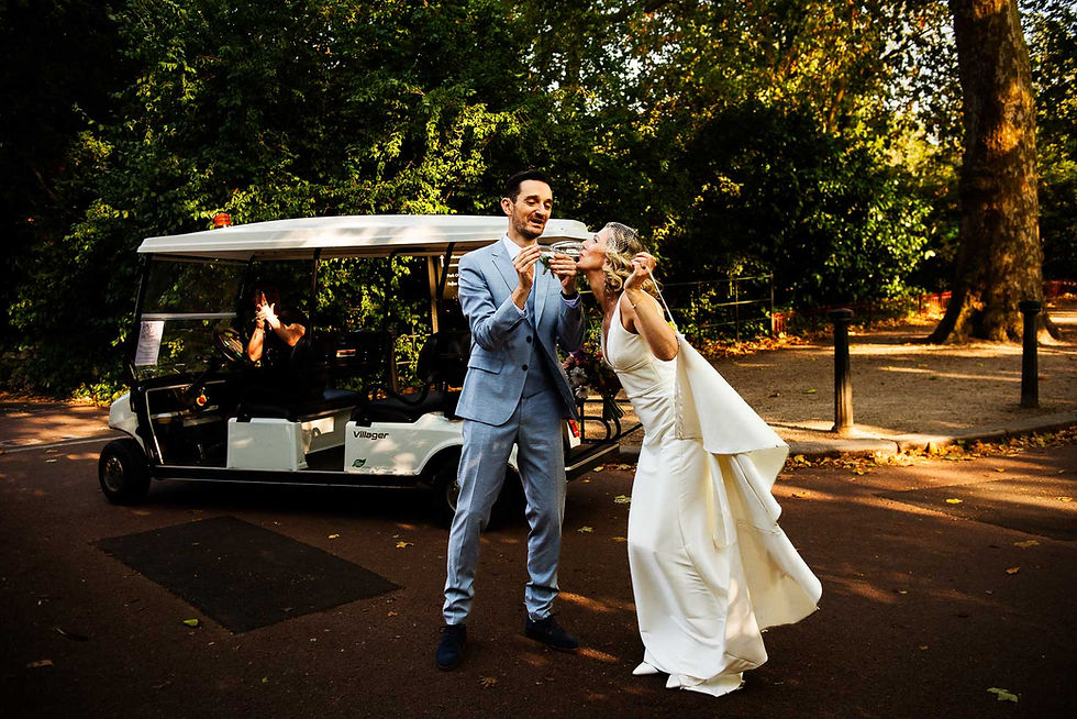 Bride drinks champaign from grooms glass