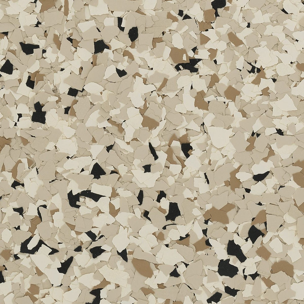 Beige, cream, and black vinyl flakes cover the surface, creating a textured pattern with no visible background or text.