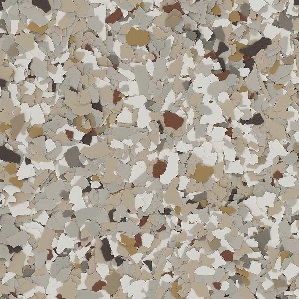 A textured surface covered in irregular vinyl flake. beige, gray, white, and brown flakes, forming a random, camouflaged pattern. No text present.