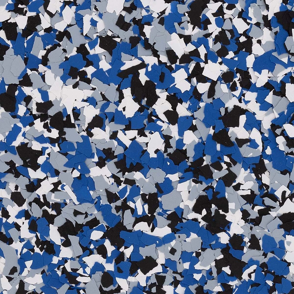 Blue, black, white, and gray vinyl flake chips scattered randomly, creating a dynamic abstract pattern. No text visible.