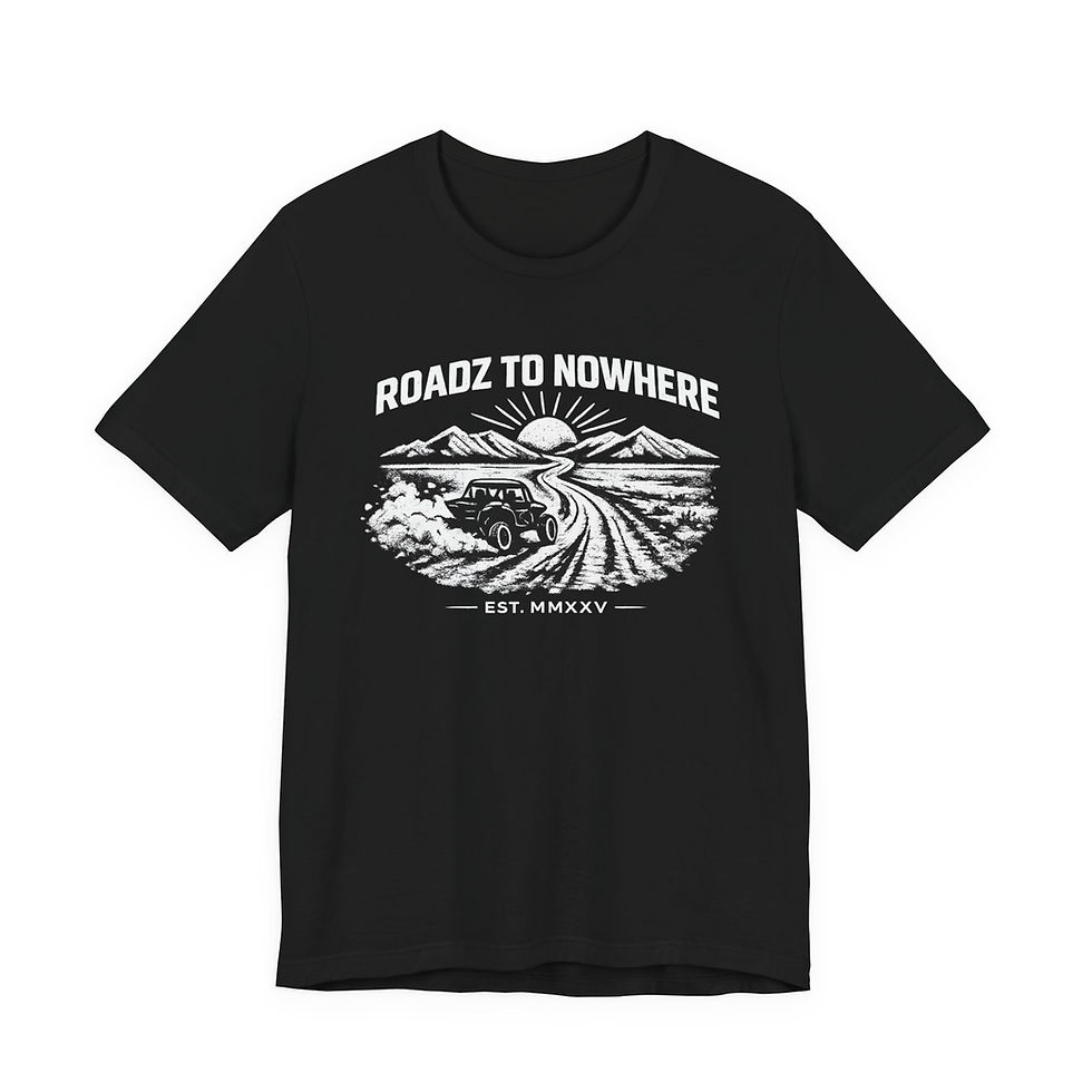 Thumbnail: Man wearing Roadz to Nowhere vintage off-road t-shirt in rugged desert landscape