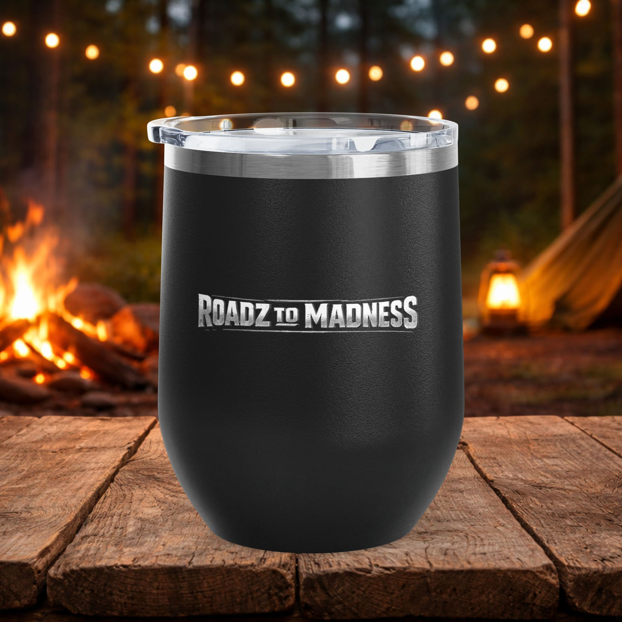 ROADZ TO MADNESS black cocktail tumbler with lid by a campfire" or "Double-walled stainless steel wine tumbler in white and b