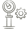 Gray icon showing an award ribbon with a checkmark on a stand, next to a gear, symbolizing achievement, quality, or certification in a technical or mechanical context.