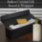 Bullion spiced rum coconut bottle and gift box side view with box open