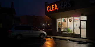 dry cleaner storefront in the fog.