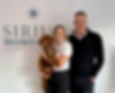 Chloe and Pete, the owners of Sirius Homecare, with their small dog.
