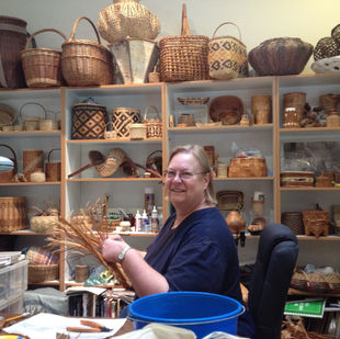 Chris Warren weaving in her studio