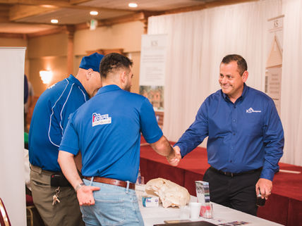 KS Management Services networking with industry partners and event sponsors.
