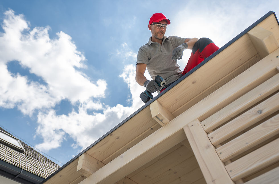 construction-worker-on-roof-using-drill-2025-03-15-02-50-57-utc.jpg