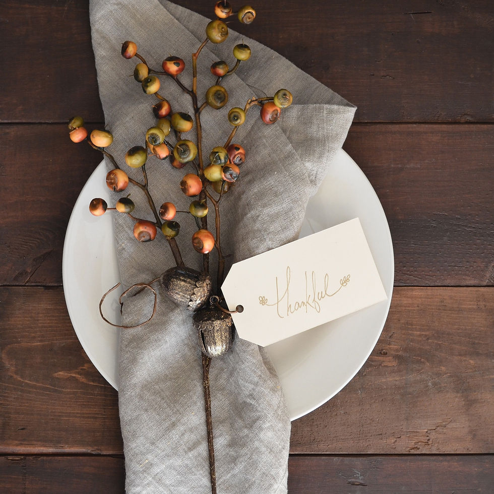 dinner place setting with thankful tag