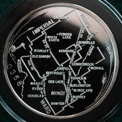 1986 MINOT, WARD COUNTY, NORTH DAKOTA CENTENNIAL COIN - One Oz. Silver. Each one was numbered. Map of the region on reverse.