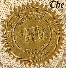 Shiny-gold Stock Certificate Corporate Seal, Showing a Grizzly Bear at Center. Western History.