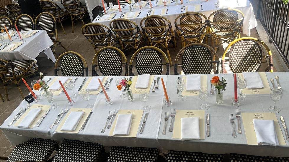 a table set for a dinner with a menu that says bistro on it