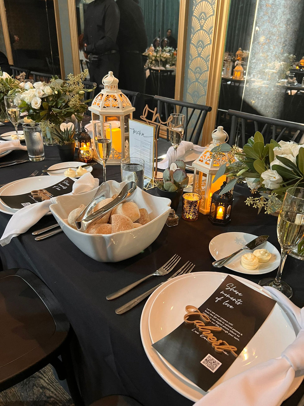 a place setting with a menu that says share moments of love