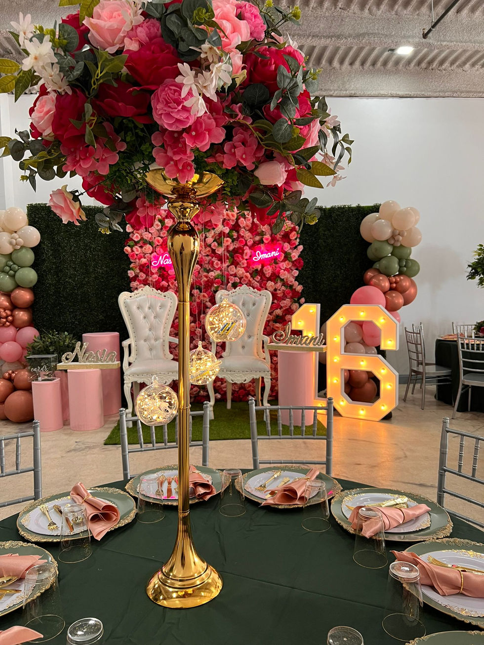 a table set up for a party with the number 5 in the background