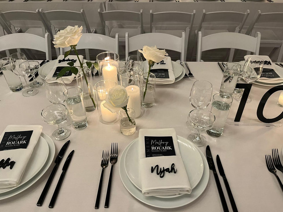 a place setting with a napkin that says nyah on it