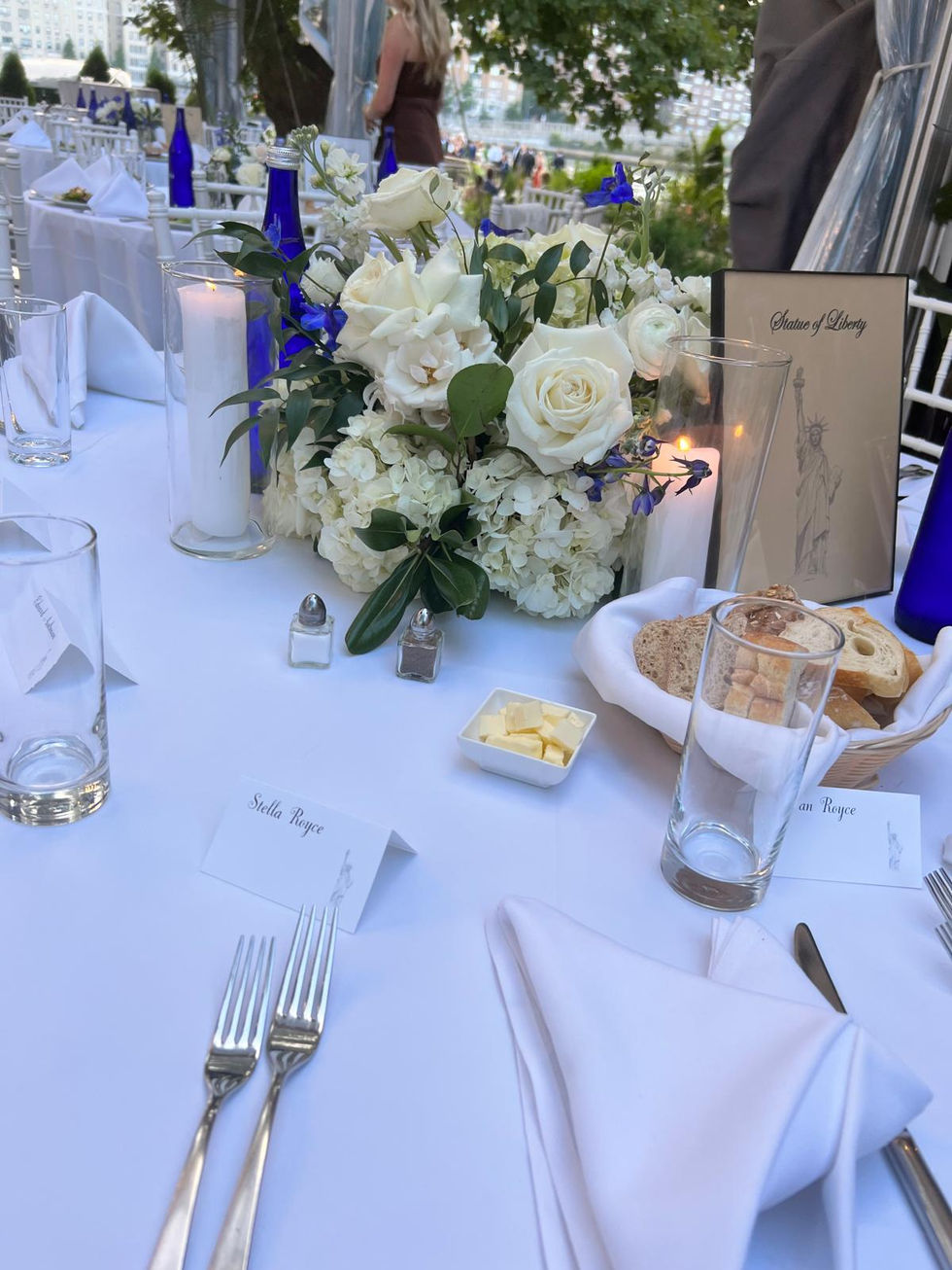 the name stella is on a place card on a table