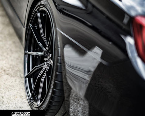 Black VS10 Wheel on a Sports car