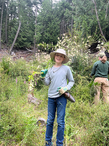 Youth Conservation Corps crew member, Beau Bernhardt, has spent his summer hard at work on conservation projects across the islands.