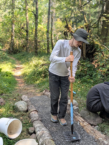 YCC Crew Member building a new trail during the Summer 2026 Program.