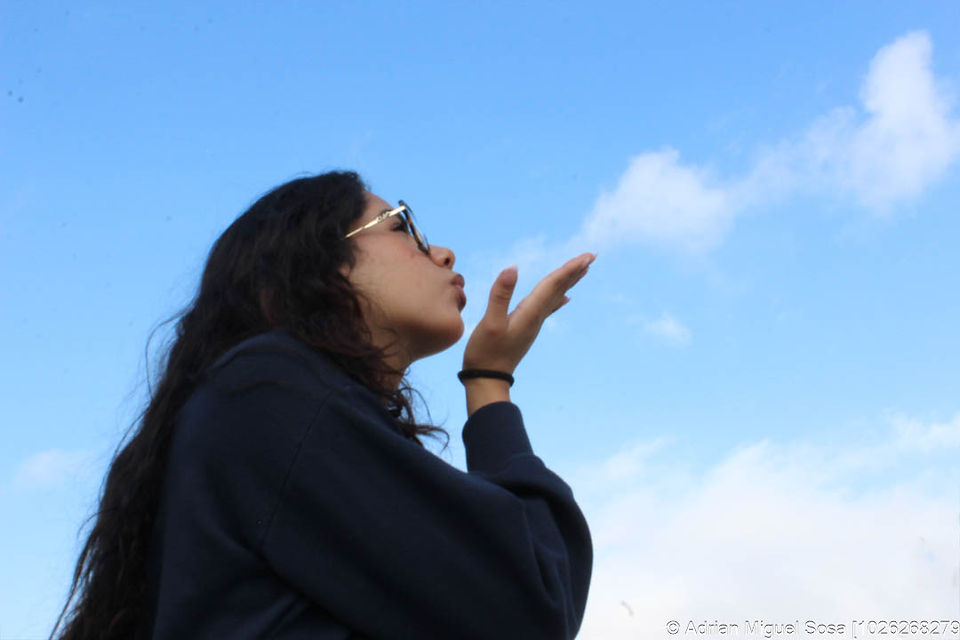 Blowing out a cloud.