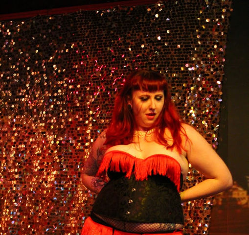 Pearl in red and black outfit