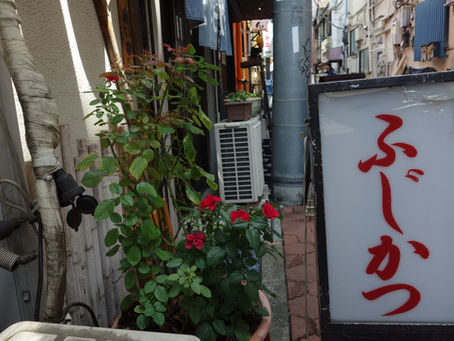 Backstreets lined with small semi-outdoor eateries