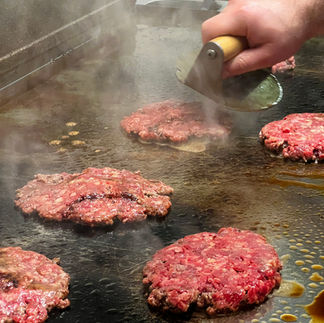 Smash burgers on the pan