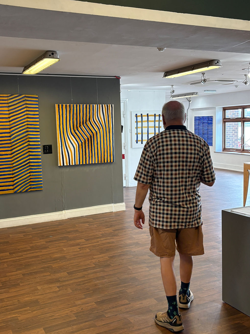 Sam Scoggins at an exhibition of his work. July 2026