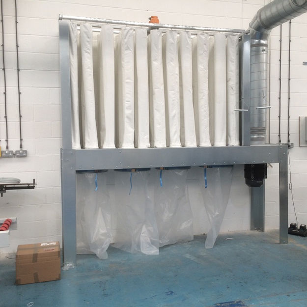 Dust filtration bagging unit