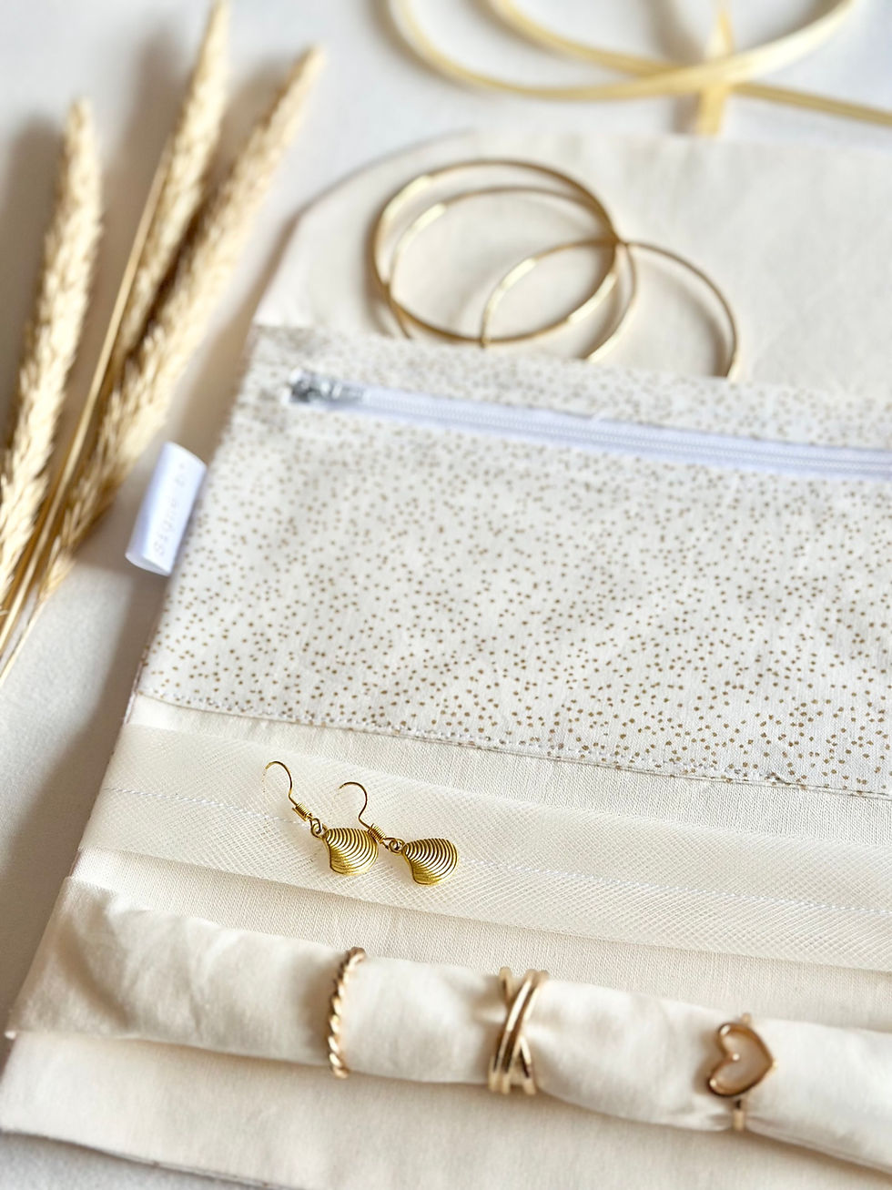 Miniatura: Pochette à bijoux pois dorés 