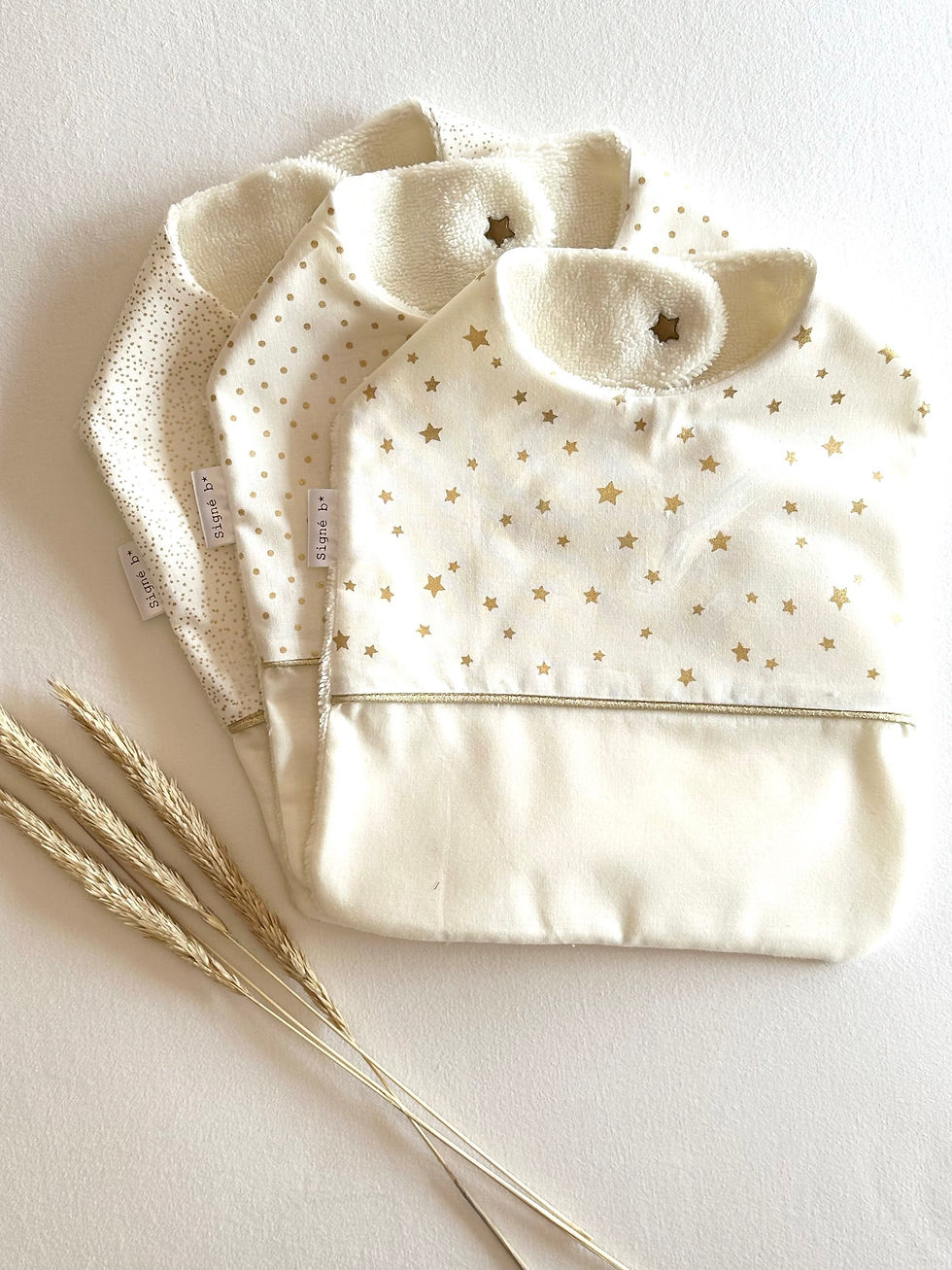 Thumbnail: Bavoir Étoiles dorées 