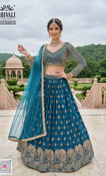 Designer blue bridal lehenga for Indian weddings and receptions. Shop authentic luxury bridal wear online in the USA.