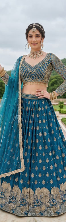 Designer blue bridal lehenga for Indian weddings and receptions. Shop authentic luxury bridal wear online in the USA.