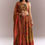 Thumbnail: Rust Orange Tissue Lehenga Choli With Floral Print