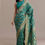 Thumbnail: Turquoise Green Dola Silk Saree With Zari Weaving