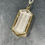 Thumbnail: Engraved Spider and Web Quartz Pendant