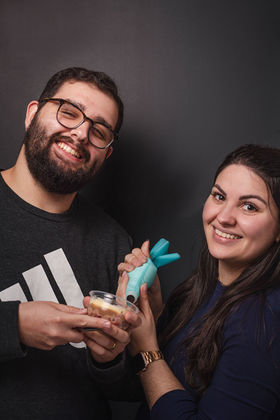 Man and woman enjoying a dessert