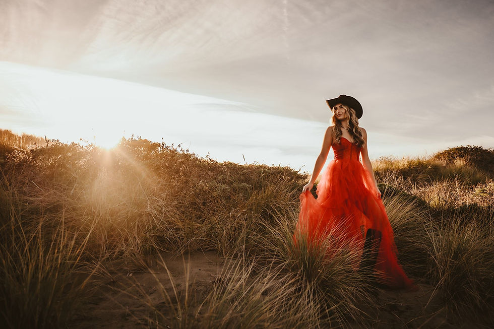 Woman in red dress wearing cowboy hat