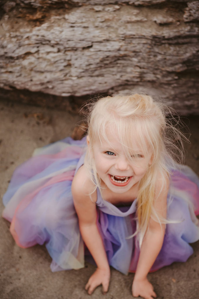 little girl on beach in dress