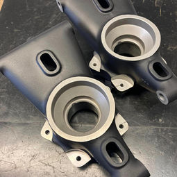 Original Ford GT40 magnesium suspension uprights and steering rack recently cleaned and re coated in Cerakote ceramic coating 