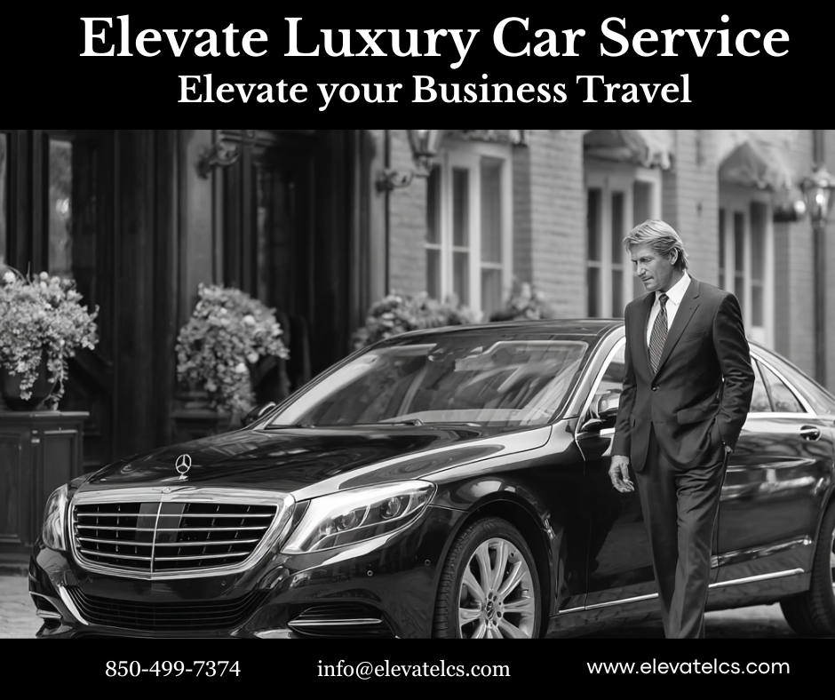 Close-up view of a business traveler working on a laptop inside a luxury car