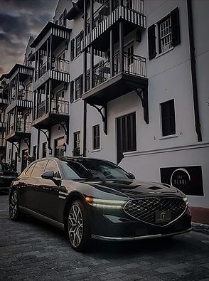 Elevates Genesis g90 parked in front of the Pearl Hotel RB