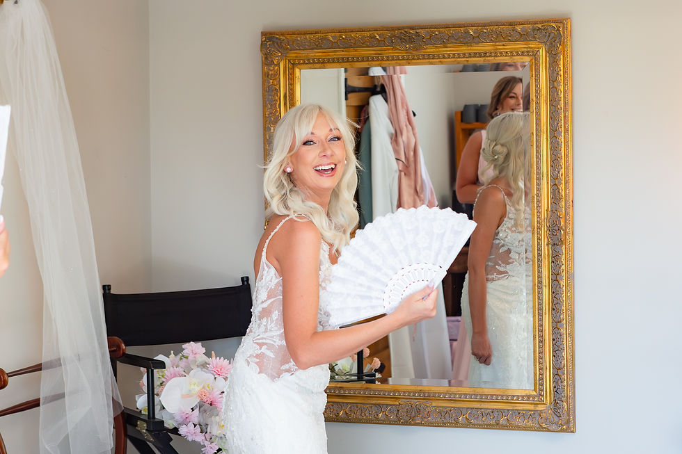 Capturing my bride fanning herself.