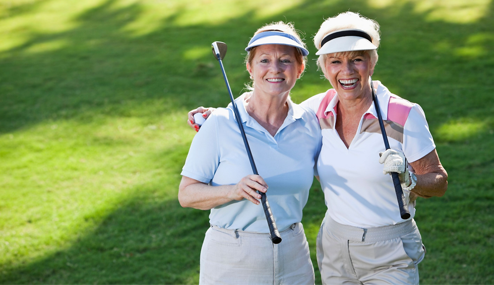 Two women playing golf and enjoying a happy and healthy lifestyle.