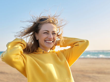 Woman enjoying time outdoors while embracing healthy aging and preparing for menopause